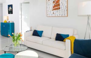 a living room with a white couch and a table at MVR Luxury Condo High Floor European Design in Miami