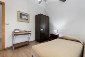 Postel nebo postele na pokoji v ubytování La Rocca Camere con bagno