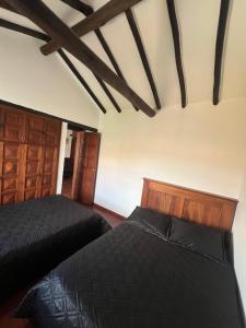 Postel nebo postele na pokoji v ubytování La Morada de la Villa 201