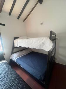 Postel nebo postele na pokoji v ubytování La Morada de la Villa 201