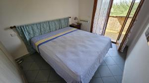 Postel nebo postele na pokoji v ubytování Residence Sole e Mare appartamenti