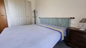 Postel nebo postele na pokoji v ubytování Residence Sole e Mare appartamenti