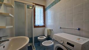 Koupelna v ubytování Residence Sole e Mare appartamenti