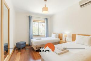 Ένα ή περισσότερα κρεβάτια σε δωμάτιο στο #327 Corcovada 43 Vista Piscina by Home Holidays