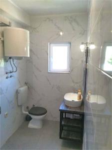 Koupelna v ubytování Apartments Dalmatia