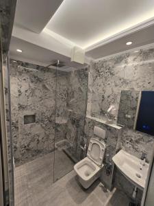Koupelna v ubytování Hotel Belvedere