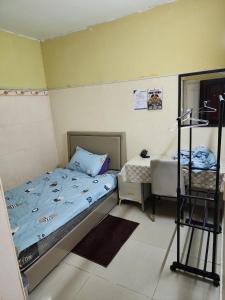 Postel nebo postele na pokoji v ubytování Molla Hotel