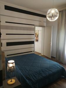 Postel nebo postele na pokoji v ubytování FalcoBianco GuestHouse