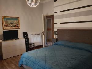 Postel nebo postele na pokoji v ubytování FalcoBianco GuestHouse