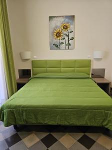 Postel nebo postele na pokoji v ubytování HOTEL ETNEA ROYAL SUITEs