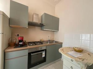 a small kitchen with a sink and a stove at Oasi Venus Perugia e Assisi in Ponte San Giovanni +18 photos