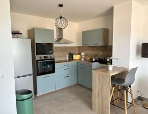 Η κουζίνα ή μικρή κουζίνα στο Appartement 2-4 pers vue mer proche port