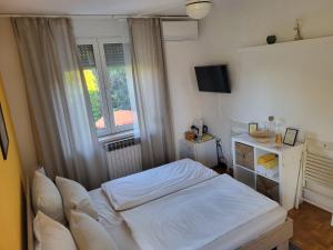 Postel nebo postele na pokoji v ubytování Villa Csipak