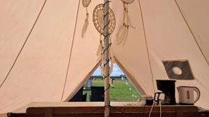 Fotografie z fotogalerie ubytování Glamping tent met privé sanitair v destinaci Hensbroek