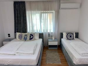 Postel nebo postele na pokoji v ubytování Vila Herta - Escape