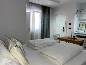 Postel nebo postele na pokoji v ubytování Vila Herta - Escape