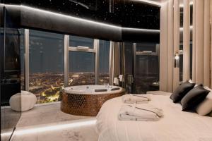 Posteľ alebo postele v izbe v ubytovaní In The Sky - Apartamenty w Sky Tower