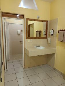 Koupelna v ubytování Hotel - Museo Xibalba