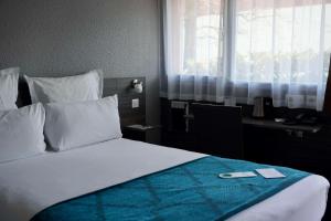 Postel nebo postele na pokoji v ubytování Sure Hotel by Best Western Biarritz Aeroport