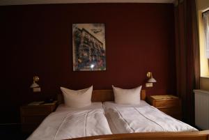 Postel nebo postele na pokoji v ubytování Hotel Kugel