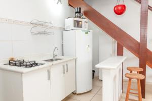 Kuchyň nebo kuchyňský kout v ubytování Apartamento Búzios + 11 fotografií