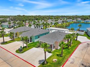 an aerial view of a neighborhood with houses and palm trees at Nauta Mirage in Rockport