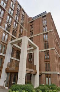 a large brick building in front at Extra large spacious 1 Bedroom private apartment, Nr St Albans City Station, Business, contractor, Parking, WiFi in Saint Albans