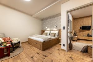 Postel nebo postele na pokoji v ubytování Apartmány Plavy + 10 fotografií