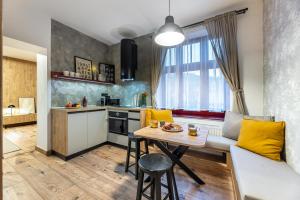 Kuchyň nebo kuchyňský kout v ubytování Apartmány Plavy