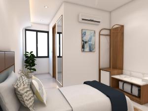 a bedroom with a bed and a couch at Radha Ratna Hotel in Ayodhya +3 photos