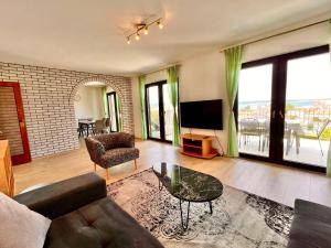 TV a/nebo společenská místnost v ubytování Apartments Gorana