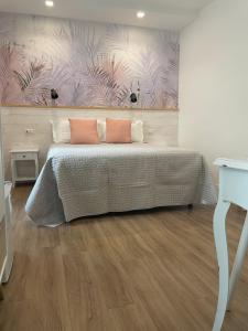 Voodi või voodid majutusasutuse Catalogna10 Rooms toas