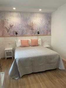 Voodi või voodid majutusasutuse Catalogna10 Rooms toas
