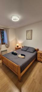 Postel nebo postele na pokoji v ubytování Maison de campagne avec piscine privative