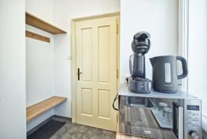 Príslušenstvo na prípravu kávy alebo čaju v ubytovaní Apartmány VIENNA