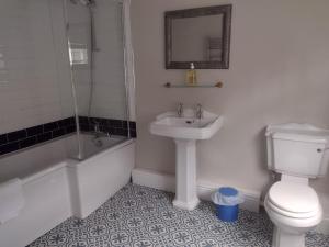 Koupelna v ubytování The Courtyard Mews