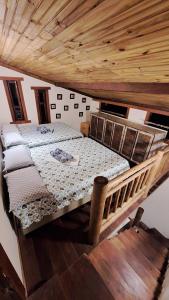 Ένα ή περισσότερα κρεβάτια σε δωμάτιο στο CASA 2/4 MELHOR LOCALIZAÇÃO DE PRAIA DO FORTE!!!!