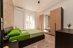 Postel nebo postele na pokoji v ubytování Salerno Centro Holiday House