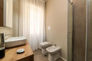 Koupelna v ubytování Salerno Centro Holiday House + 39 fotografií