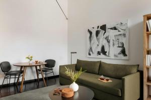 Posezení v ubytování Sonder by Marriott Bonvoy Ida Apartments Downtown + 34 fotografií