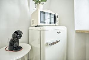 Kuchyňa alebo kuchynka v ubytovaní Apartmány VIENNA