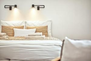 Posteľ alebo postele v izbe v ubytovaní Apartmány VIENNA
