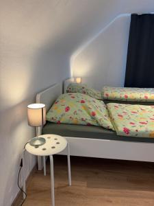 Postel nebo postele na pokoji v ubytování komham-walberla