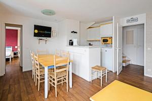 Kuchyň nebo kuchyňský kout v ubytování Résidence Belle Dune - maeva Home - 4 Pièces 6 Personnes - Prestige MAE-1657