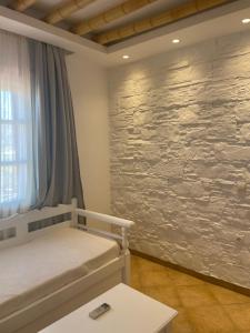 Postel nebo postele na pokoji v ubytování Acti Plaka Hotel + 37 fotografií