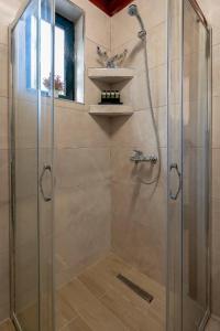 Ένα μπάνιο στο Vadina Apartment 1
