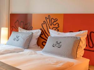 Postel nebo postele na pokoji v ubytování Hotel Begardenhof