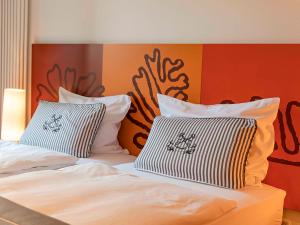 Postel nebo postele na pokoji v ubytování Hotel Begardenhof