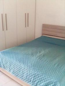 Ένα ή περισσότερα κρεβάτια σε δωμάτιο στο Agàpe House