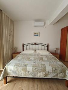 Ein Bett oder Betten in einem Zimmer der Unterkunft Apartments Miljas